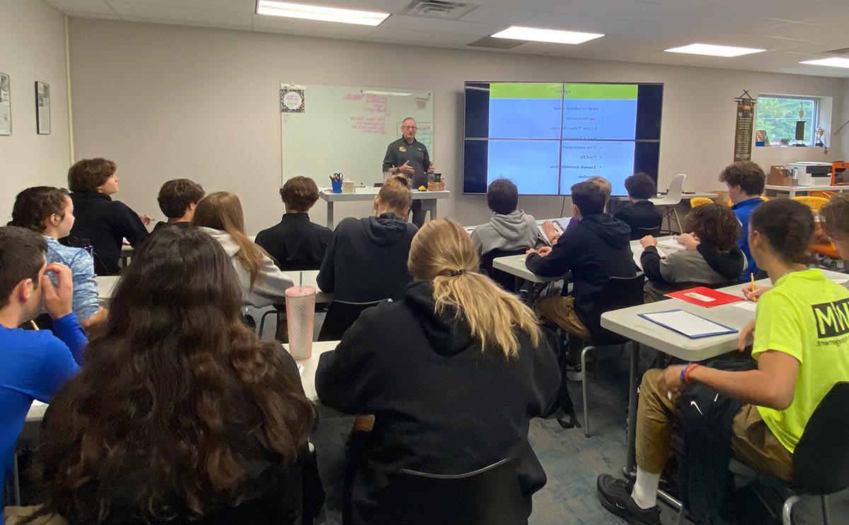 BW Professor Dan Schrag in a high school classroom